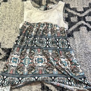 Selling a beautiful flowy kids shirt! Perfect condition and will wash before.